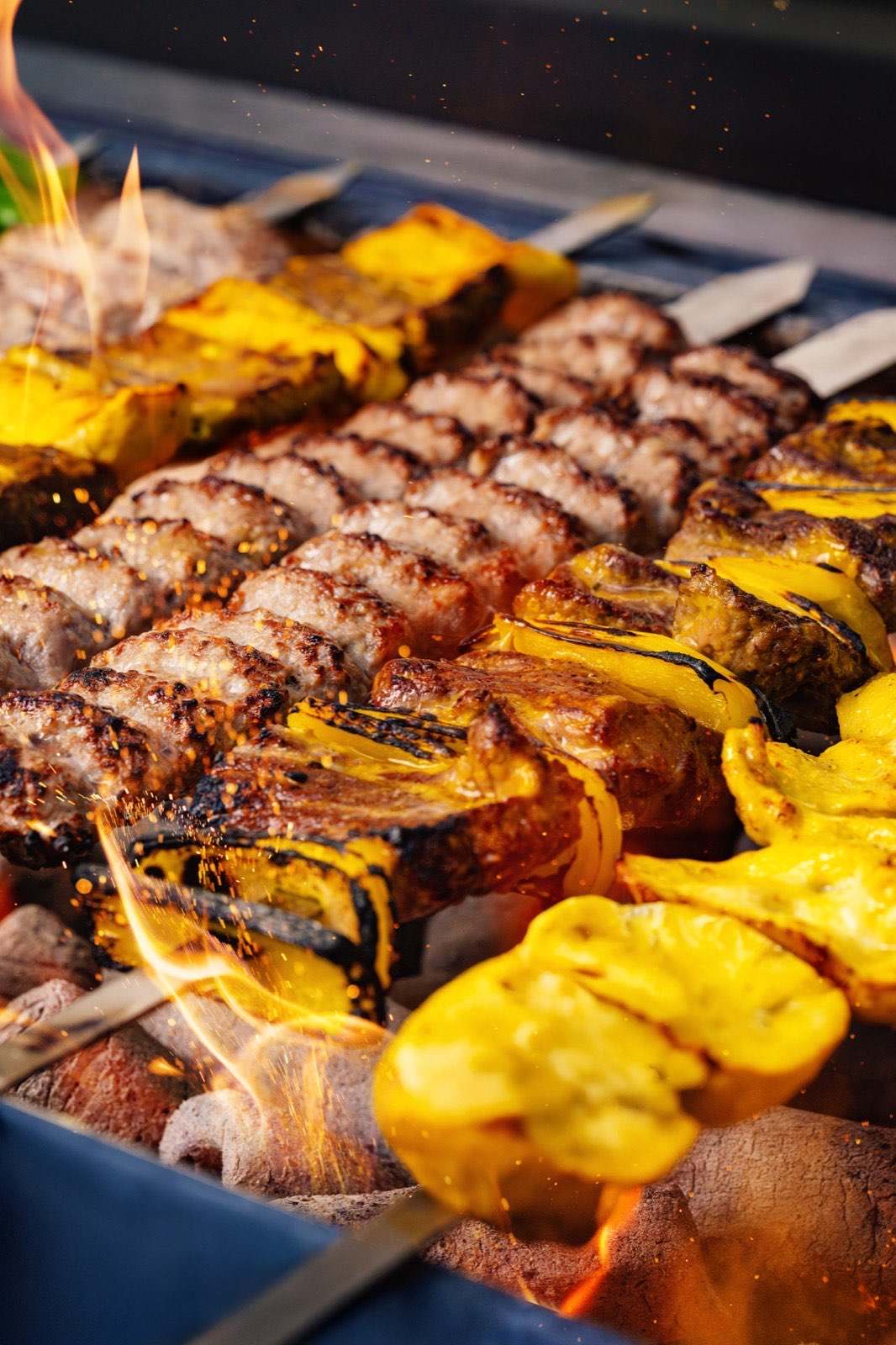 Food photography in Bahrain by Epic Content: kebabs on the grill at Golestan