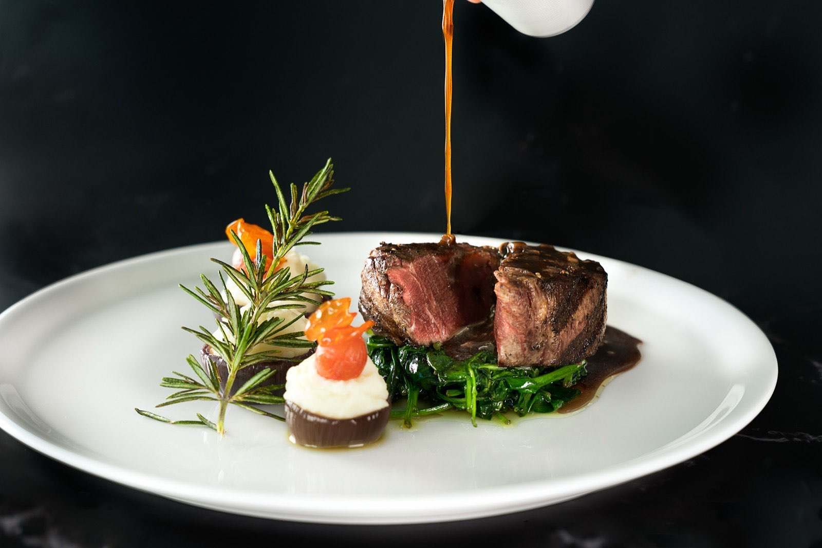 Menu photography in Bahrain by Epic Content: steak with jus at Capital Club